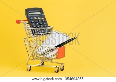 Shopping List, Check Out And Payment Or Shopping Calculation Concept, Calculator, Notepad And Pen Fo