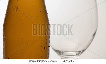 Misted Bottle Of Beer On The Table Macro