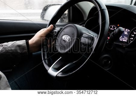 Moscow, Russia - January 2, 2020: Black Steering Wheel With The Kia Logo Close-up. The Interior Of A
