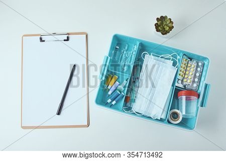Top View Of Medical Items And Empty Paper Blank Sheet On The White Background. Healthcare And Medici