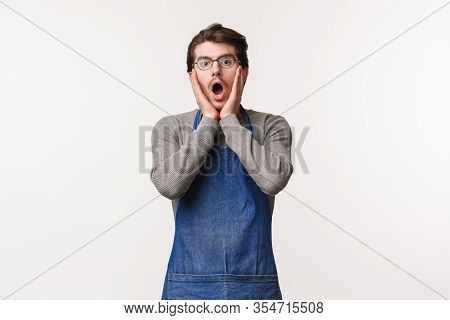 Portrait Of Shocked And Amazed Handsome Young Man Working Over Bar Counter, Barista Scream In Amazem
