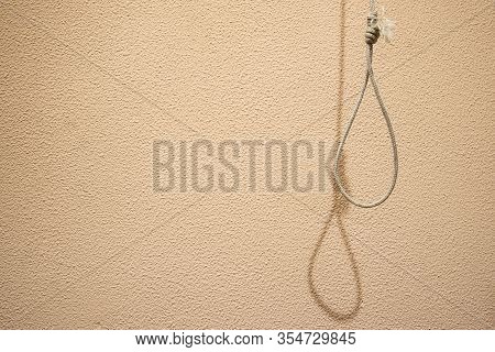 Human Psychological Problems Hanging Suicide Concept Poster Picture Of Thread Loop With Shadow On So