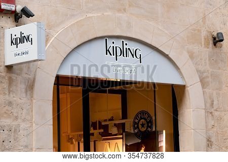 Valletta, Malta - October 29, 2019: The Entrance Door To The Outlet Of The Kipling Company With A Li