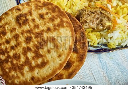 Warqi Paratha, Indian Flatbread, Kashmiri Cuisine, Traditional Assorted Indian  Dishes, Top View.