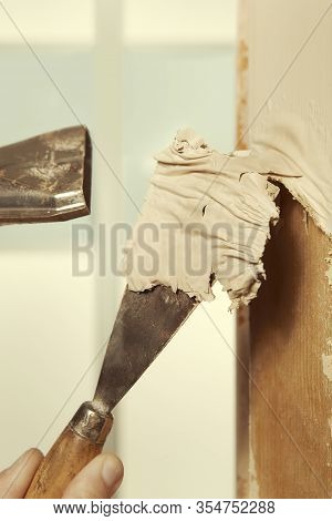 Detail Of Removing Havy Layer Of Old Paint From Door