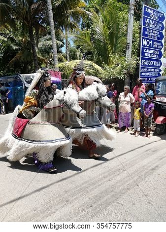 Carnival In Poya Day On The Streets Of Mirissa. Dressed People Celebrating Poya Day. March, 9, 2020,