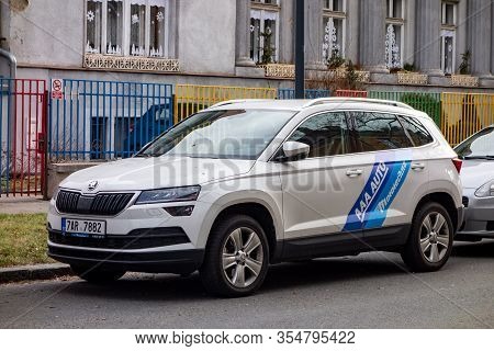 Ostrava, Czechia - February 19, 2020: White Skoda Karoq Suv Car With Blue Stripes Of The Aaa Auto Mo