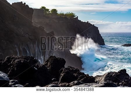 Dangerious Ocean Stormy Waves Hits Black Lava Rocks On La Palma Island, Canary, Spain