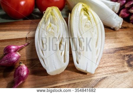 Fresh Belgian Endive Or Chicory Bitter Salad Ready To Cook Or Eat Close Up