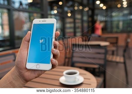 Chiang Mai, Thailand - Feb.17,2020: Man Holding Apple Iphone 8plus With Twitter App.twitter Is An On