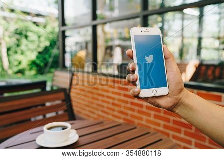 Chiang Mai, Thailand - Feb.17,2020: Man Holding Apple Iphone 8plus With Twitter App.twitter Is An On