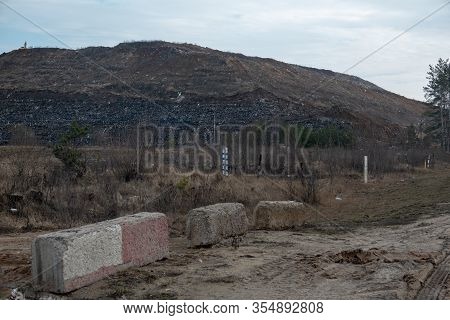 View Of The Mountain Dump With A Tractor