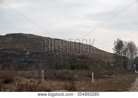 View Of The Mountain Dump With A Tractor