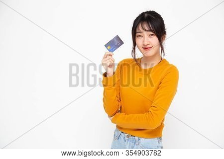 Happy Asian Woman Holding Credit Card Or Cash Advances, Pay Instead Of Money And Specially Curated B