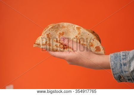 National Food Concept. Mexican National Food Tacos Or Tatar National Food - Kystyby In Hand On An Or