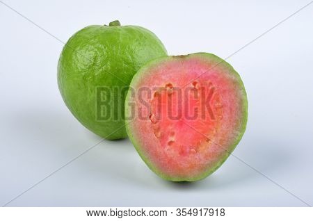 Group Of Red Guava Fruit In White Background