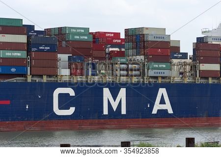 Doel, Belgium, 21 July 2019 A Close Up Of The Container Ship Cma Cgm That Leaves The Port Of Antwerp
