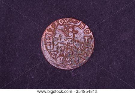 Ancient Grand Duchy Of Lithuania Coin Shilling Isolated On The Black Background