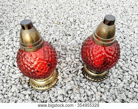 Decorated Cemetery Lantern Candles Placed On The Breakstone Graveyard Ground
