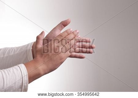 Happy Young Man Clapping Hands