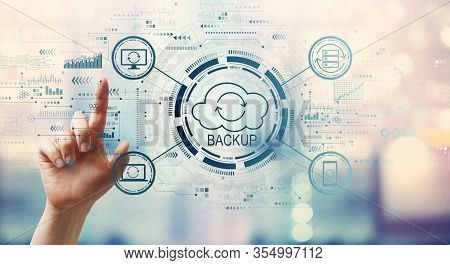 Backup Concept With Hand Pressing A Button On A Technology Screen