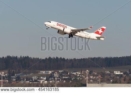 Zurich, Switzerland, February 10, 2022 Swiss International Airlines Bombardier Cs-100 Aircraft Take 