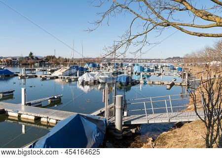 Wangen-lachen, Switzerland, February 13, 2022 Many Boats In A Small Harbor At The Lake Of Zurich