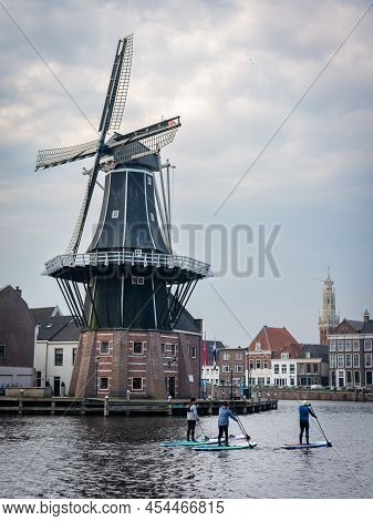 Haarlem, North Holland, The Netherlands, 20.03.2022, People Paddleboarding Through The Canals Of Haa