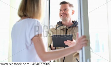 Smiling Man Conducting Social Survey In Apartment. Population Census Concept