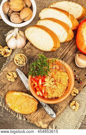 Traditional Middle Eastern Dip Muhammara. Roasted Red Bell Pepper With Walnuts And Spices