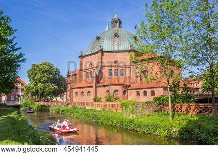 Nordhorn, Germany - May 15, 2022: Pedal Boat In Front Of The Historic St. Augustinus Church In Nordh