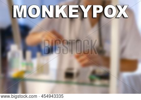 Monkeypox. Nurse. Medical. Text Written On An Unfocused Background Of A Nurse With An Injection To G