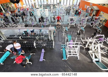 MOSCOW, RUSSIA - MAY 8, 2014: Fitness center Gold Gym with traineger equipments. In Russia, Gold Gym opened in 1996.