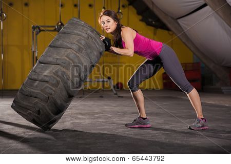 Strong Girl Flipping A Tire