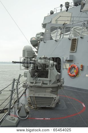 MK-38 25mm chain gun aboard the guided-missile destroyer USS McFaul during Fleet Week 2014