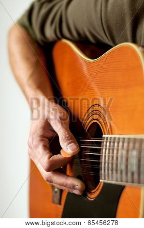 Playing a 12 string acoustic guitar