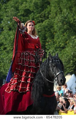 Riga, Latvia - August 21: Camilla Naprous From The Devils Horsemen Stunt Team Riding Beautiful Black