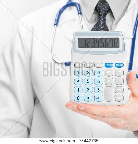 Doctor Holdling In His Hand Calculator - Heath Care Concept