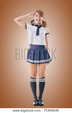 Japanese style school girl in sailor suit, full length portrait.