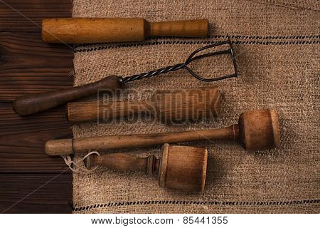 real vintage wooden and iron mashers on old grain sacking linen Completely hand made  handwoven and homespun