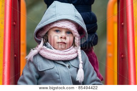 Cute Little Girl With Big Blue Eyes Looking At Camera - Very Shallow Depth Of Field