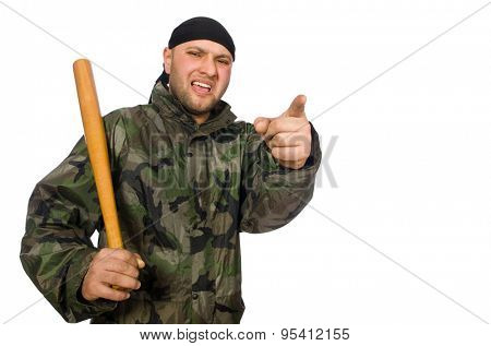 Young man in soldier uniform holding bludgeon isolated on white