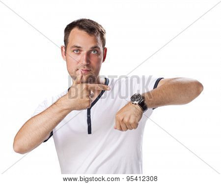 Worrier man running out of time looking his watch isolated on a white background 