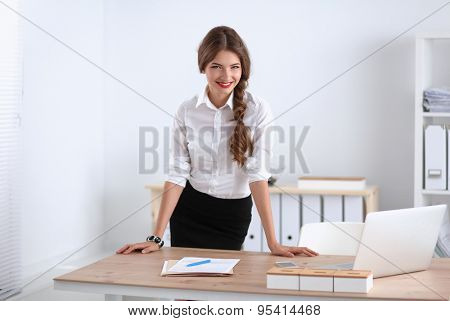 Attractive businesswoman stnding
