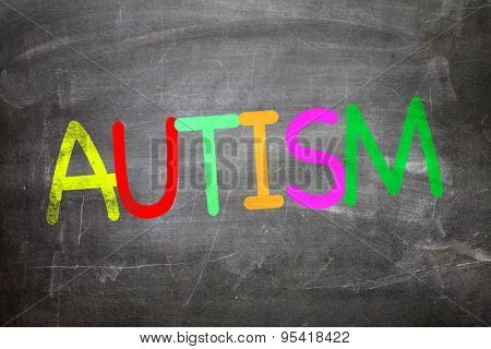 Autism written on a chalkboard