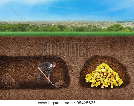 Businessman digs a tunnel to treasure