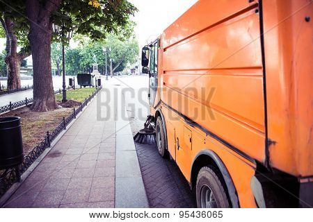 Special sweeper cleans the pavement in the city
