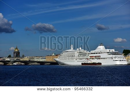 ST. PETERSBURG, RUSSIA - JUNE 23, 2015: Cruise ship Silver Whisper anchored at English Embankment. The liner of company SILVERSEA may accommodate 382 guests