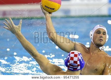 BARCELONA - AUG, 1: Norbert Hosnyanszky of Hungary in action against Croatia during a World Championship BCN2013 at the Picornell Swimming pool on August 1 2013 in Barcelona Spain