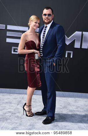 LOS ANGELES - JUN 28:  Beth Behrs & Michael Gladis arrives to the 